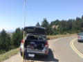 Antenna installed on roadside behind car parked on Ridgecrest